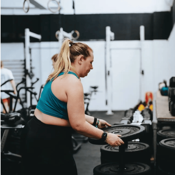 woman training with weights